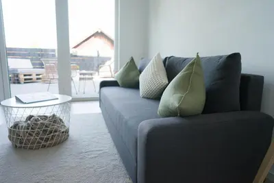Ein Sitzbereich in der Unterkunft Ferienwohnung Im Wiesengrund