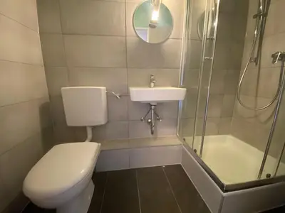Ein Badezimmer in der Unterkunft 1-Zimmerwohnung mit Balkon