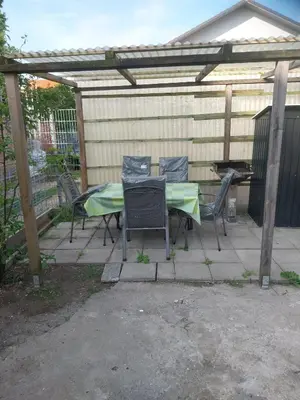 Ein Patio oder anderer Außenbereich in der Unterkunft 2 Zimmer Monteur- und Ferienwohnung mit kleinen Wintergarten