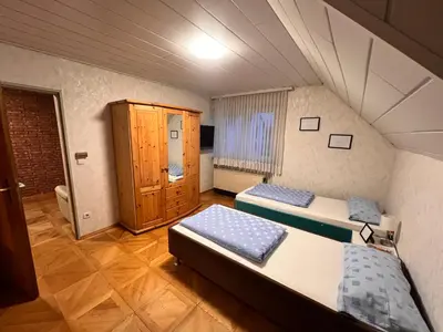 Ein Bett oder Betten in einem Zimmer der Unterkunft Apartment I9I0 I MONTEURUNTERKUNFT