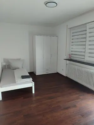 Ein Bett oder Betten in einem Zimmer der Unterkunft Unterkunft REHBERG Zimmer I