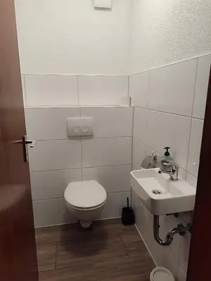 Ein Badezimmer in der Unterkunft Unterkunft REHBERG Zimmer I