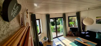 Ein Sitzbereich in der Unterkunft Ferienwohnung Odenwaldliebe