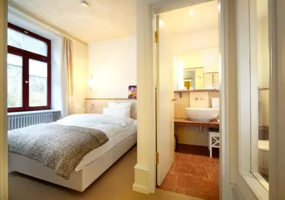 Ein Bett oder Betten in einem Zimmer der Unterkunft Villa Trautz Appartements