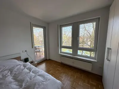 Ein Bett oder Betten in einem Zimmer der Unterkunft Wohnung am Neckar mit Tiefgarage