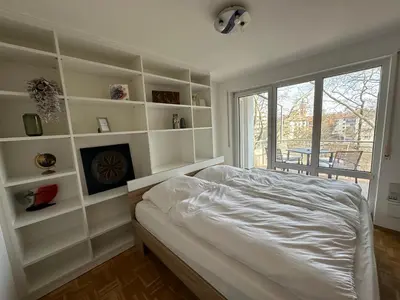 Ein Bett oder Betten in einem Zimmer der Unterkunft Wohnung am Neckar mit Tiefgarage