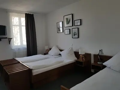 Ein Bett oder Betten in einem Zimmer der Unterkunft Gasthaus Zum Ochsen