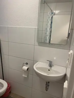 Ein Badezimmer in der Unterkunft Exklusiv modernisierte Traumwohnung mit High-End-Lüftungssystem
