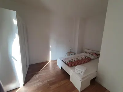 Ein Bett oder Betten in einem Zimmer der Unterkunft Schönes Privatzimmer an der Uniklinik Mainz