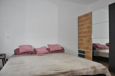 Ein Bett oder Betten in einem Zimmer der Unterkunft Modernes Apartment in B'heim 1 OG WG3