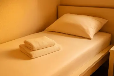 Ein Bett oder Betten in einem Zimmer der Unterkunft SMS-Homes I Auszeit am Wartberg-Heilbronn