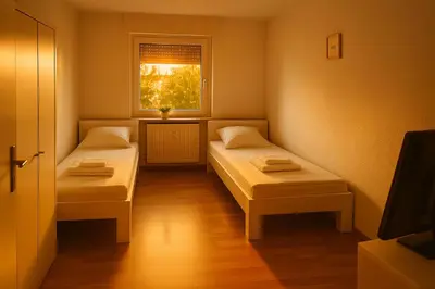 Ein Bett oder Betten in einem Zimmer der Unterkunft SMS-Homes I Auszeit am Wartberg-Heilbronn