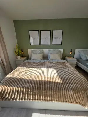 Ein Bett oder Betten in einem Zimmer der Unterkunft Moderne Wohnung mit Balkon in Karlsruhe