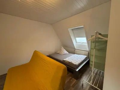 Ein Bett oder Betten in einem Zimmer der Unterkunft See You 2