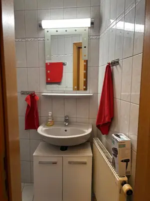 Ein Badezimmer in der Unterkunft See You 2