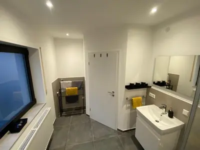 Ein Badezimmer in der Unterkunft Bienensuite