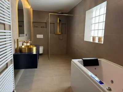 Ein Badezimmer in der Unterkunft Toscana Suite - Wellness Loft