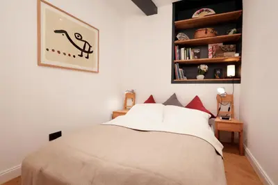 Ein Bett oder Betten in einem Zimmer der Unterkunft Studio 1833