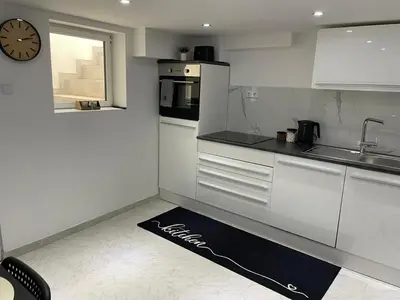 Küche/Küchenzeile in der Unterkunft Stadtnah & und familienfreundlich