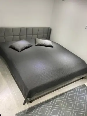 Ein Bett oder Betten in einem Zimmer der Unterkunft Stadtnah & und familienfreundlich