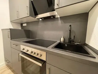 Küche/Küchenzeile in der Unterkunft NEU Goldstadt Gallery City Suite Zentrum Pforzheim am Schlössle
