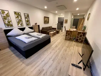 Ein Sitzbereich in der Unterkunft NEU Goldstadt Gallery City Suite Zentrum Pforzheim am Schlössle