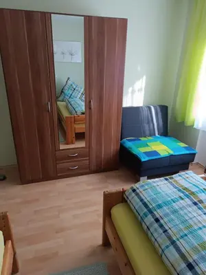 Ein Bett oder Betten in einem Zimmer der Unterkunft Ferienwohnung Schmid