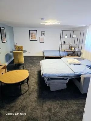 Ein Bett oder Betten in einem Zimmer der Unterkunft Gemütliche Einliegerwohnung