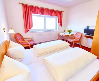Ein Bett oder Betten in einem Zimmer der Unterkunft Gästezimmer Weingut Dr Oberhofer