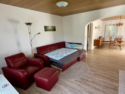 Ein Sitzbereich in der Unterkunft Ferienhaus zur Glockenhornquelle