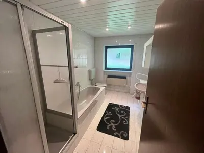 Ein Badezimmer in der Unterkunft Ferienhaus zur Glockenhornquelle