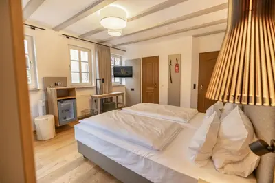 Ein Bett oder Betten in einem Zimmer der Unterkunft Schockes Laurentiushof
