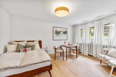 Ein Bett oder Betten in einem Zimmer der Unterkunft Black Forest Flower Apartment