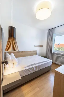 Ein Bett oder Betten in einem Zimmer der Unterkunft Haus am Weinberg