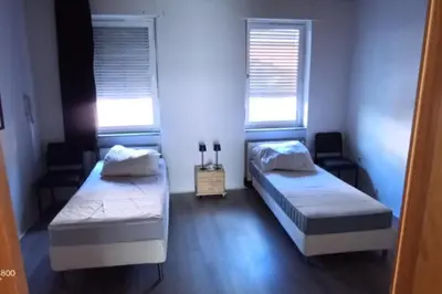 Ein Bett oder Betten in einem Zimmer der Unterkunft NEU! Monteurwohnung Philippsburg