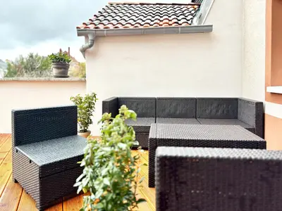 Ein Sitzbereich in der Unterkunft COZEE - Spacious Apartment With Netflix