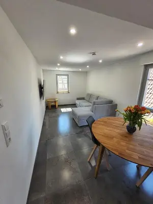 Ein Sitzbereich in der Unterkunft Carles Bauernhaus