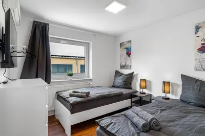Ein Bett oder Betten in einem Zimmer der Unterkunft BE01 Große Wohnung in Dieburg