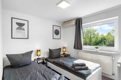 Ein Bett oder Betten in einem Zimmer der Unterkunft BE01 Große Wohnung in Dieburg