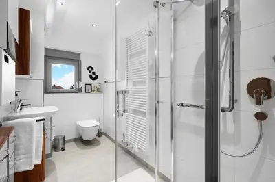 Ein Badezimmer in der Unterkunft The Elegant