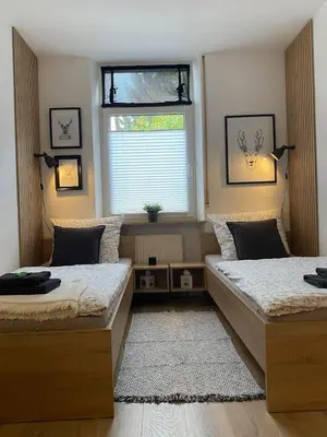 Ein Bett oder Betten in einem Zimmer der Unterkunft Wohnung für bis zu 5 Gäste in Hockenheim, Nähe Walldorf, Speyer, Mannheim, Heidelberg, Ludwigshafen