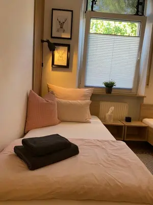 Ein Bett oder Betten in einem Zimmer der Unterkunft Wohnung für bis zu 5 Gäste in Hockenheim, Nähe Walldorf, Speyer, Mannheim, Heidelberg, Ludwigshafen
