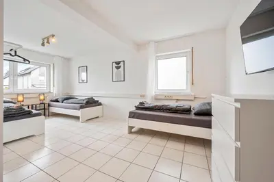 Ein Bett oder Betten in einem Zimmer der Unterkunft RH01 Apartment in Bensheim