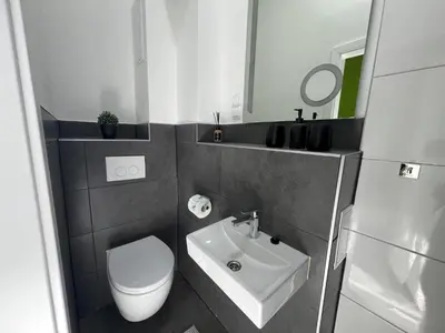 Ein Badezimmer in der Unterkunft Feel Good Zimmer & Appartements