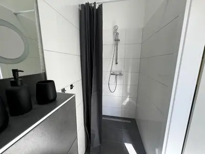 Ein Badezimmer in der Unterkunft Feel Good Zimmer & Appartements