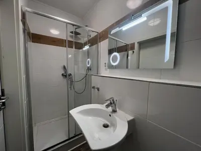 Ein Badezimmer in der Unterkunft Feel Good Zimmer & Appartements