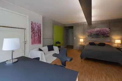 Ein Bett oder Betten in einem Zimmer der Unterkunft Lollipops-100qm-5Bed-Parken-View