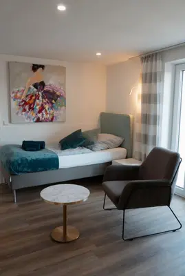Ein Sitzbereich in der Unterkunft FERIENWOHNUNG TRAUMBLICK - Familienfreundlich - Handwerker willkommen