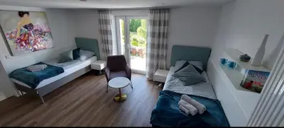 Ein Bett oder Betten in einem Zimmer der Unterkunft FERIENWOHNUNG TRAUMBLICK - Familienfreundlich - Handwerker willkommen