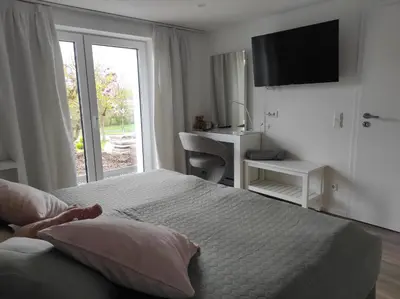 Ein Bett oder Betten in einem Zimmer der Unterkunft FERIENWOHNUNG TRAUMBLICK - Familienfreundlich - Handwerker willkommen